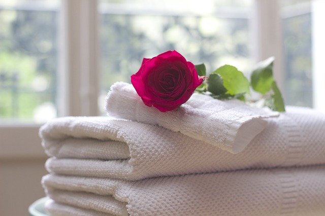 Towels with rose on top